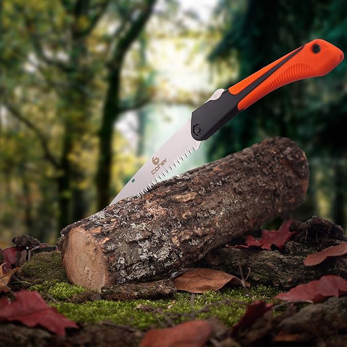 Folding Hand Saw resting on a log in a forest setting, highlighting its portability and effectiveness for camping and wood cutting.