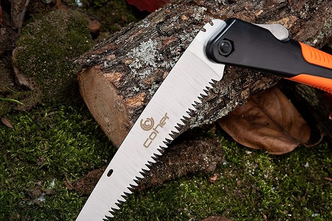 Folding Hand Saw cutting through a tree branch, showcasing its sharp 65Mn steel blade for efficient pruning and outdoor use.